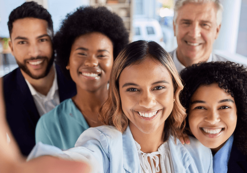 Diverse group of smiling professionals – Demographic Data Append service for targeted marketing segmentation