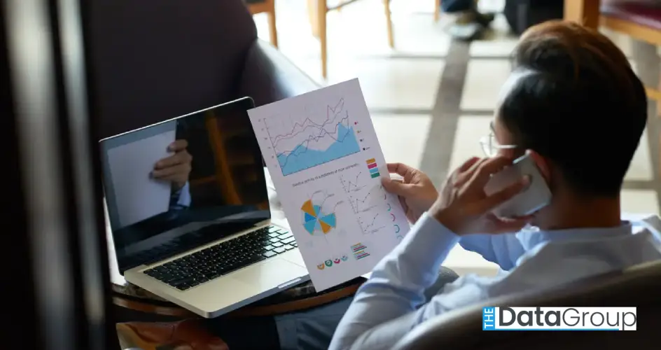 person looking in marketing graph 1